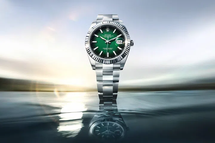 Rolex Oyster Datejust 41 in white Rolesor with green lacquer ombre dial, fluted bezel and Oyster bracelet.