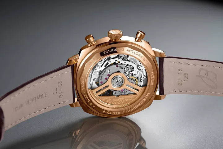 Back view of the Breitling Top Time B01 Chronograph 41 Tribute to Aston Martin DB5, showing the Manufacture Calibre 01 and Aston Martin-engraved rotor through the sapphire caseback.