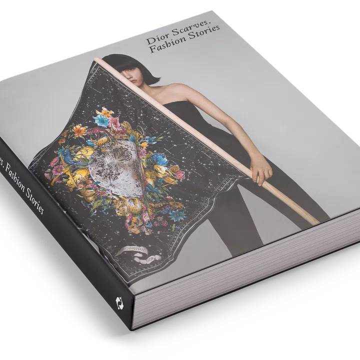 This Dior coffee table book is a catalogue of 425 scarf designs spanning 78 years. (Photo: Dior)
