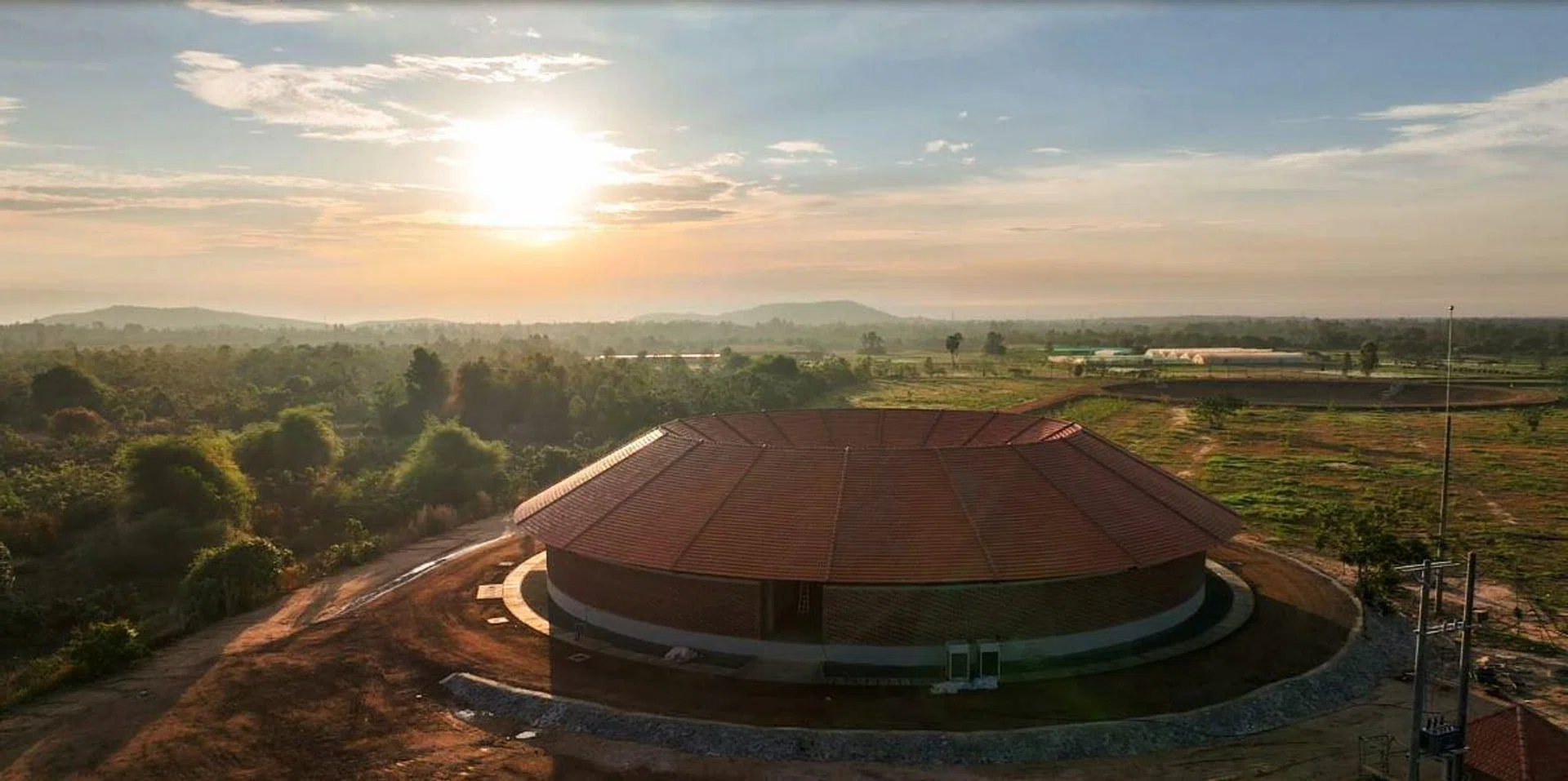 The sun sets on The Gong, a cultural centre on the Smiling Gecko Cambodia property. (Photo: Smiling Gecko Cambodia)