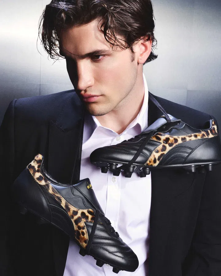 Pair of Dolce & Gabbana x Diadora Brasil sneakers featuring a monochromatic design with leopard-print details, inspired by the classic football boot.