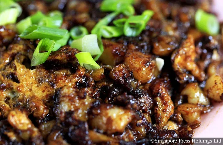 Tan Sai Heng of Heng Home made Carrot Cake with Prawn and Oyster Omelette