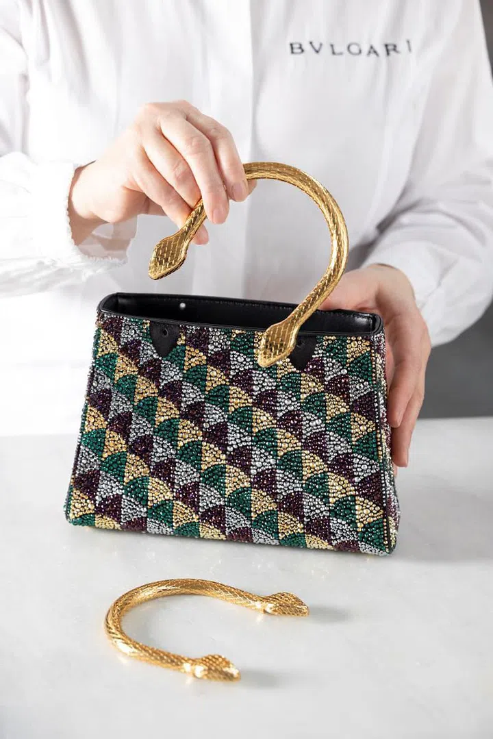 The making of a crystal-paved Serpentine Duo bag with engraved, double-headed snake handles (Photo: Bvlgari)