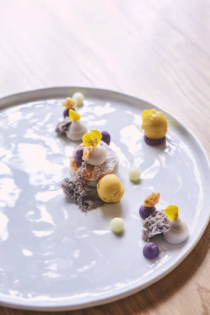 The Orh NeeYam Pastewith Pumpkin Persimmon Ice Cream & Candied Lard is pretty in presentation.