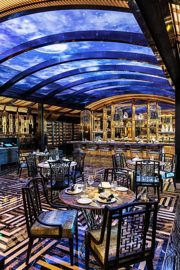 The LED ceiling in Mesa’s main dining area displays natural scenery, echoing the windowed ceiling and skylight in designer Karl Lagerfeld's Paris studio. (Photo: Grand Lisboa Palace Macau)