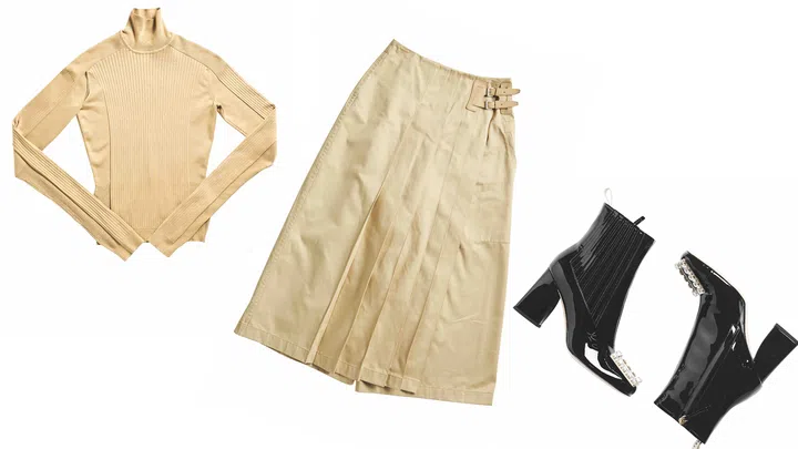The Hermes mustard-coloured outfit worn by Rhonda Wong, paired with boots.