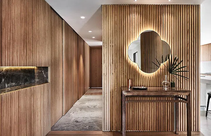 Heirloom Chinese console with a custom-designed plum blossom mirror.