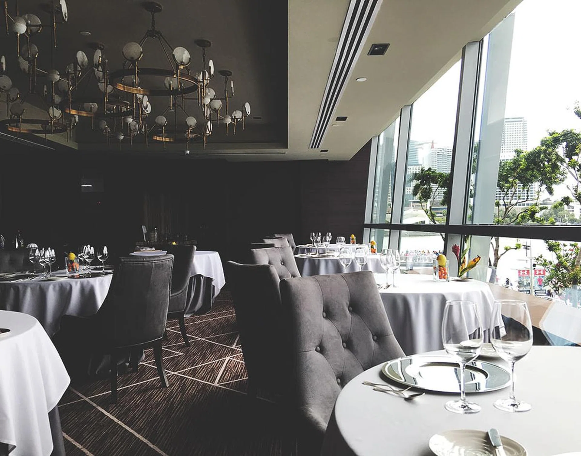 Expect immaculate service and tasteful furnishings in Saint Pierre's new perch at One Fullerton.