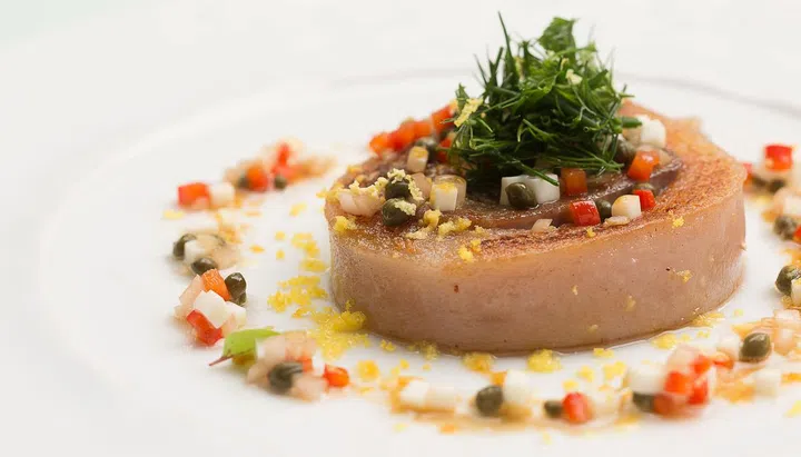 Lepinoy’s clean traditional French cuisine includes highlights such as tete a veau, a headcheese made of ox tongue and calf’s head.