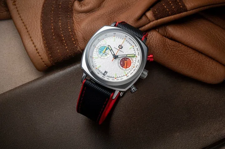 Singapore watch brands: The Geylang Watch Co Apex Hybrid Chronograph with a brushed stainless steel case, a white dial accented by contrasting blue and red chronograph counters, and a black FKM rubber strap.