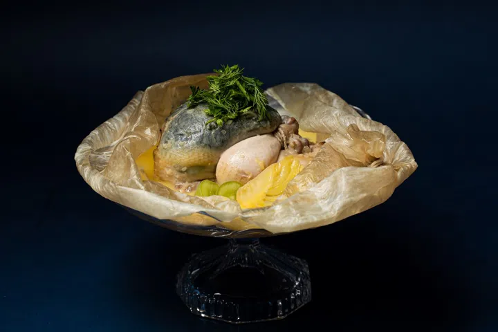 One of chef Andre Chiang’s dishes at Raw – poussin en vessie (chicken poached in a bladder, most commonly a pig’s) with tarragon butter and muscat grape.