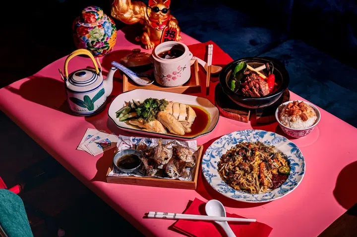A table full of Choon Hoy Parlor's dishes, including their fried laksa and Hainanese kampong chicken (Image: Choon Hoy Parlor)