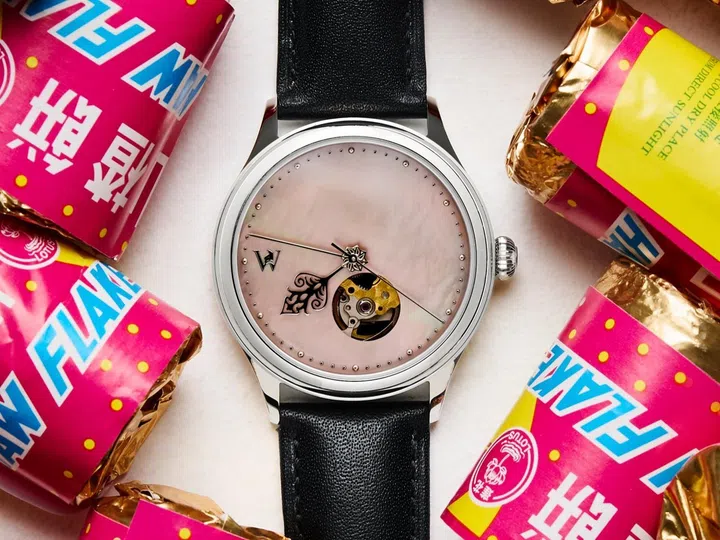 Singapore watch brands: The Waktu Horology Kalbu M.O.P. Mawar with a polished 38mm stainless steel case, a pink mother-of-pearl dial, an open-heart display, and signature hands inspired by traditional Malay songket motifs.