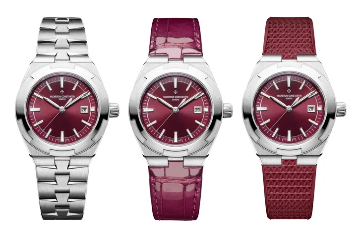 Vacheron Constantin Overseas Self-Winding in stainless steel with a deep red lacquered dial and integrated bracelet.