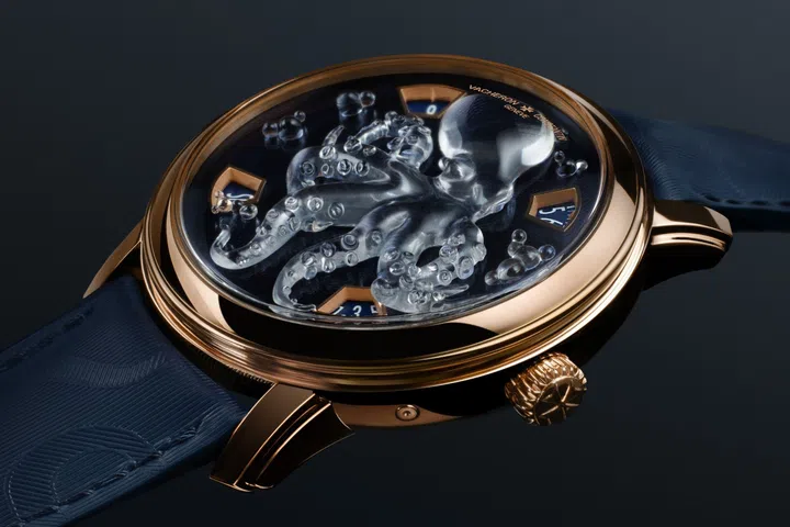 Vacheron Constantin Glassoctopus watch featuring a transparent sculpted glass octopus above a dark blue hand-guilloché gold dial.