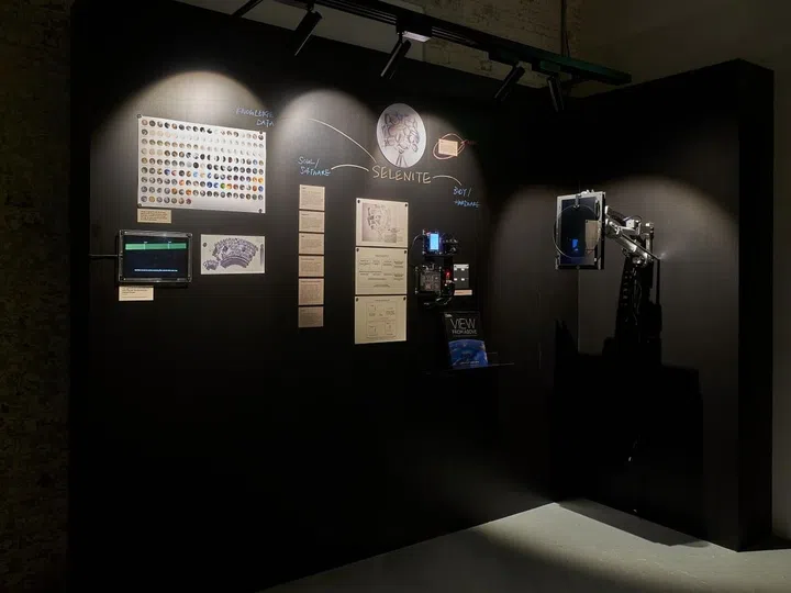 The research room detailing Hui's extensive study for the artwork.