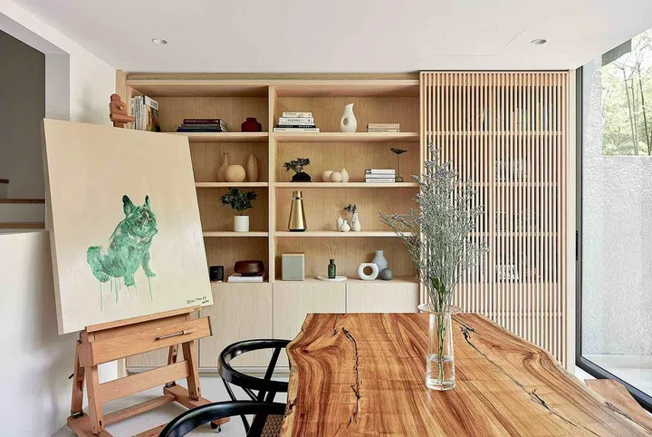  This home for a family of painters combines a soothing palette of warm tones and wood textures with intelligent space planning. Photo: EightyTwo