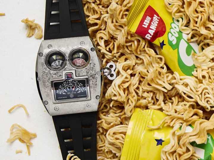 Singapore watch brands: The Azimuth Mr Roboto R1 Titanium featuring a crystallised titanium tonneau case shaped like a retro robot, with the eyes displaying the hours and GMT, the nose indicating the seconds, and the mouth serving as a retrograde minute display.