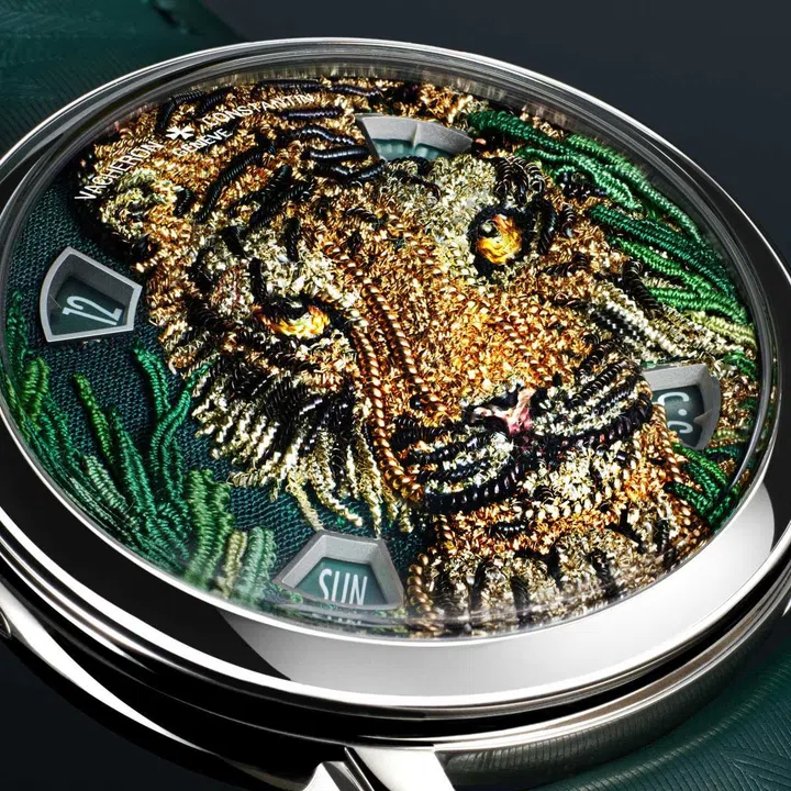 Vacheron Constantin Tigerbroidery watch featuring an embroidered tiger surrounded by green foliage crafted from gold wire and silk.