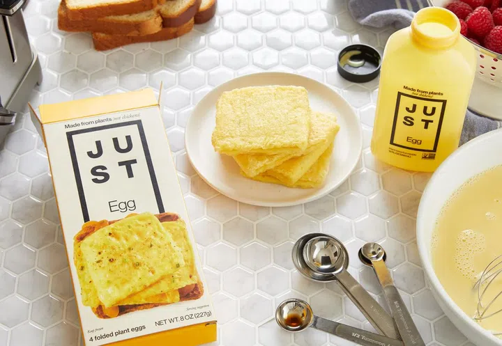 The plant-based Just Egg bottle and box on a table.