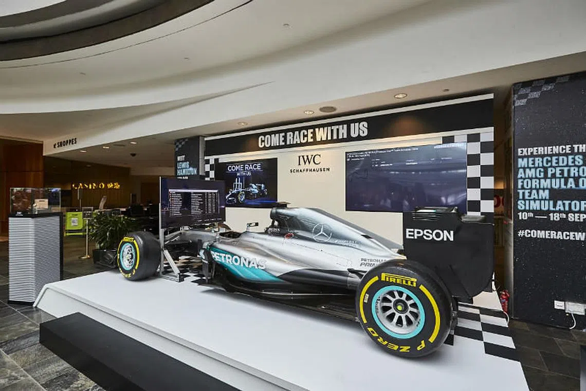 [PHOTOS]: Come race on the official petronas racing simulator with IWC ...
