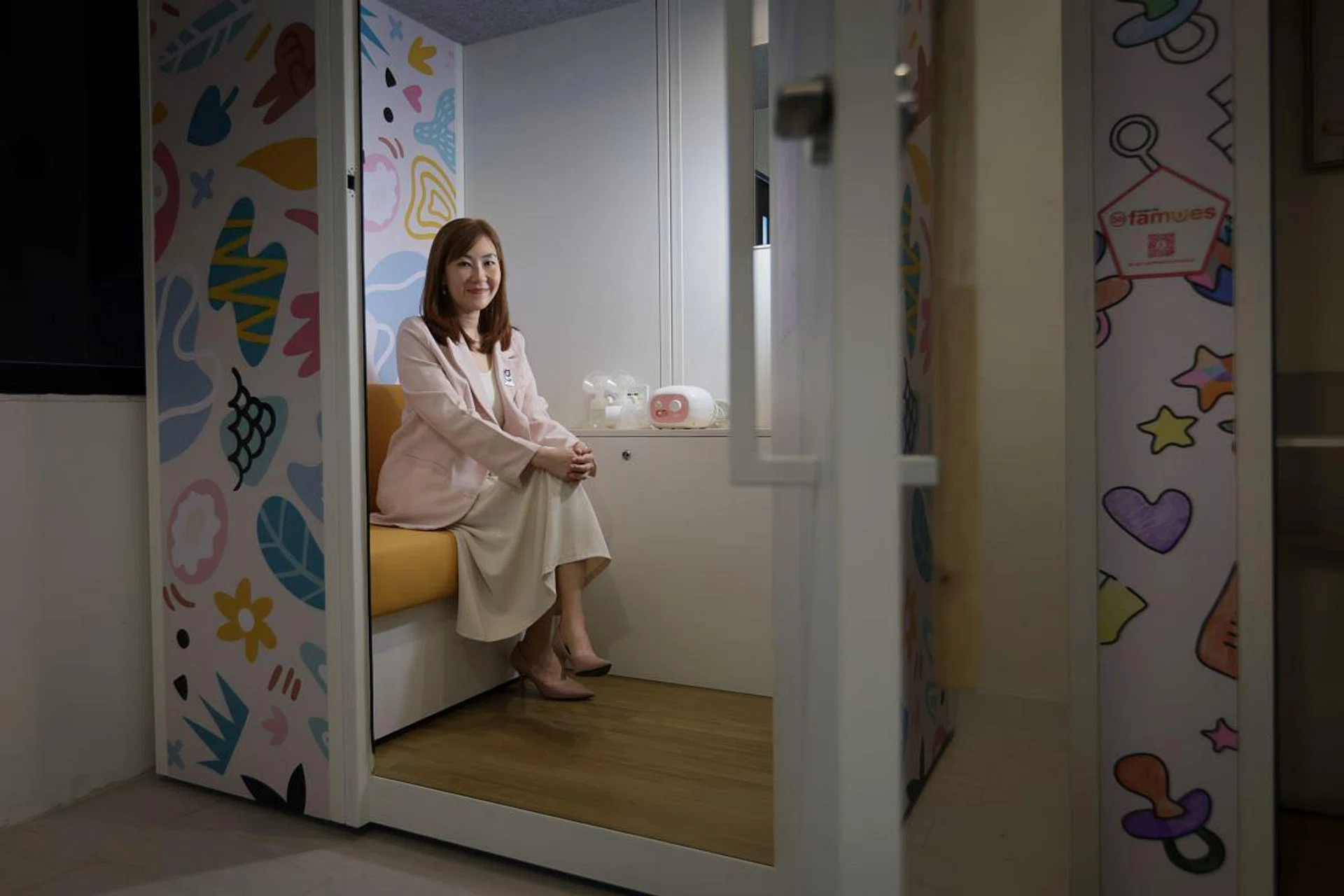 Ms Vivian Lee, co-founder and chief executive of Go!Mama, in one of the breastfeeding pods her start-up developed.About the size of a large vending machine, the pods have ergonomically designed benches, power points and dimmable lights,giving mums privacy and comfort when feeding their babies.(Photo: SPH Media, Gin Tay)