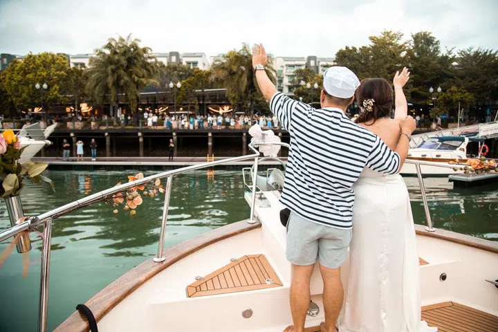 Nautical-themed wedding with yacht charter at Quayside Isle @ Sentosa Cove