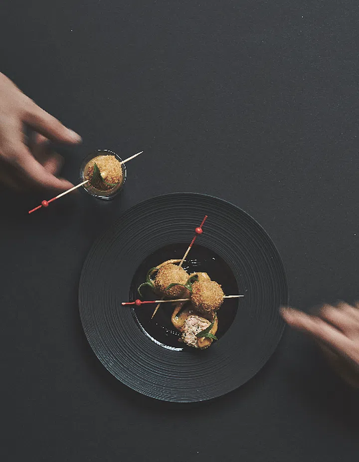 Familiar childhood flavours are given a modern spin in this dish of salmon croquettes with laksa aioli.