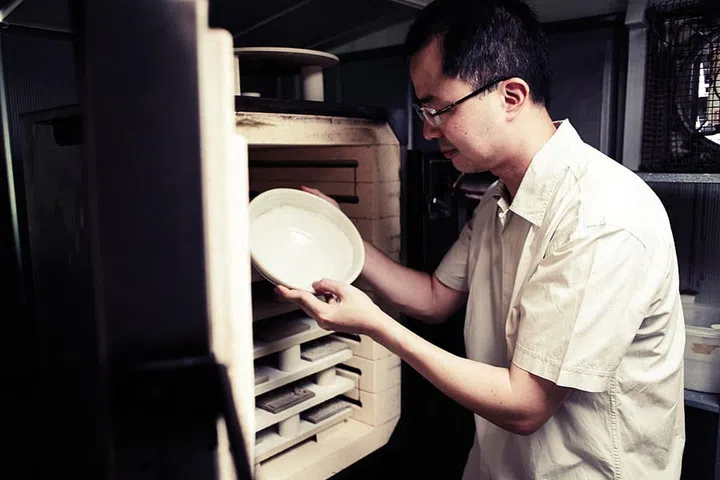 Loh first sketches his ideas, and builds prototypes to perfect his design. The clay, chosen for its colour and character, is prepared, then shaped on the potter’s wheel or in a mould created for the piece. Decorative elements are added and touch- ups are done at different stages of drying, after which the piece is glazed and fired in a kiln.