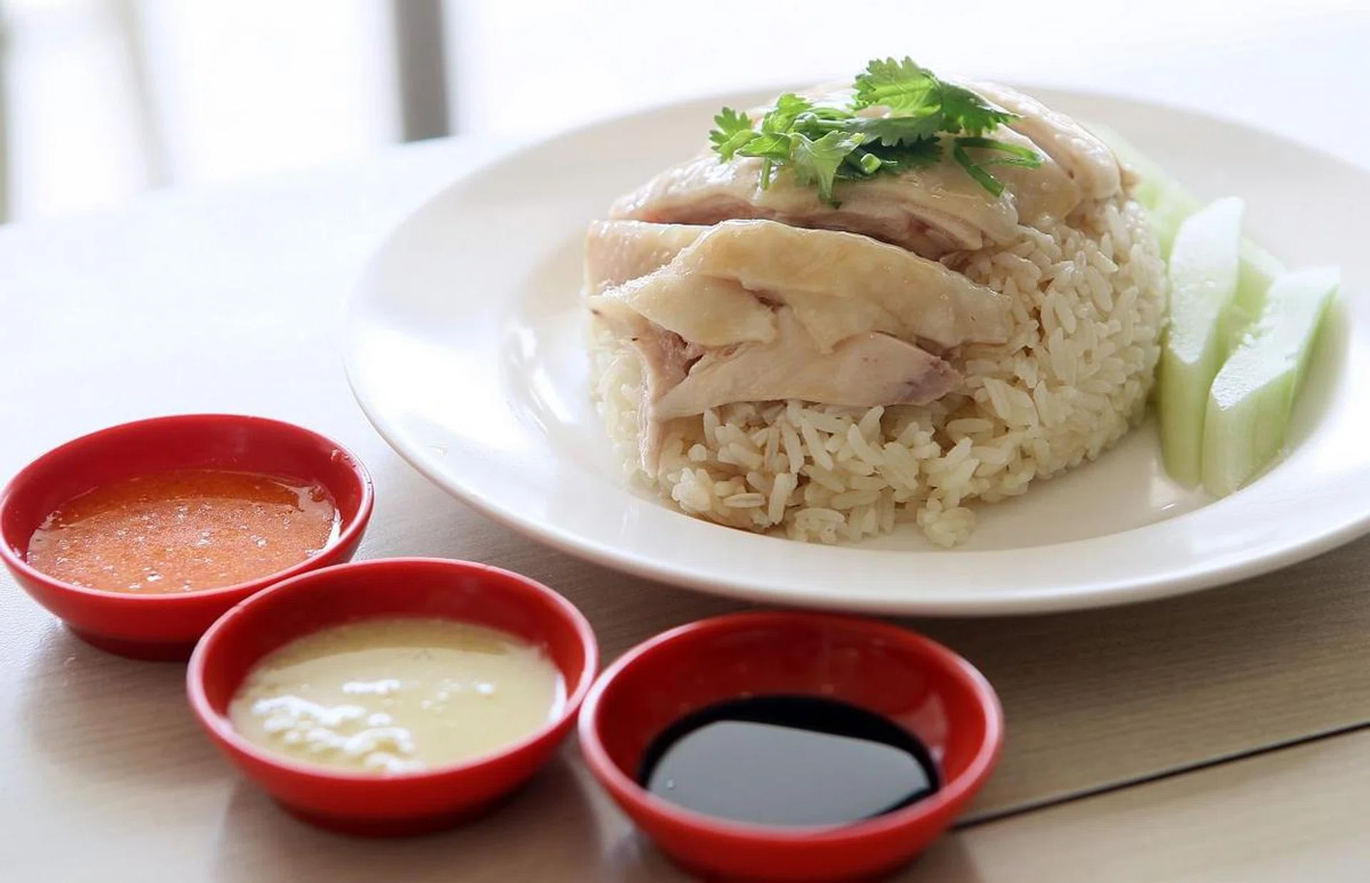 A plate of chicken rice from Tian Tian Hainanese Chicken Rice, Maxwell Food Centre.