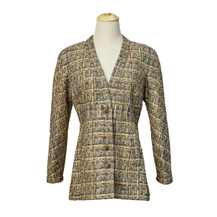 Gold and multi-coloured tweed Chanel jacket from Karl Lagerfeld’s Pre-Fall 2019 Métiers d’Art collection, featuring intricate woven textures, metallic embroidery, braided trim and jewel-like buttons inspired by the opulence of ancient Egypt