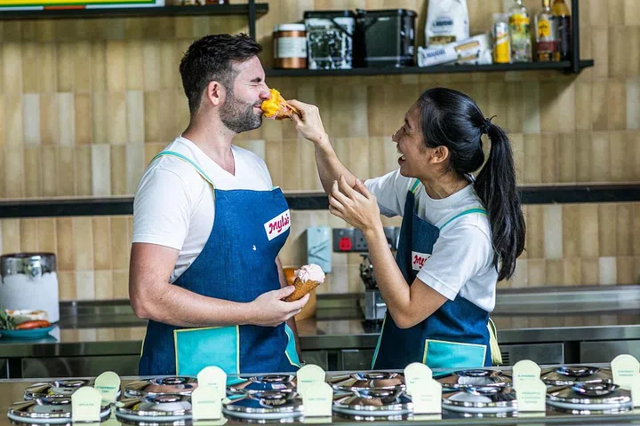 Marguerite’s chef-owner Michael Wilson (left) with his gelato at Mylo's. (Photo: Mylo's)