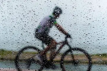 safe cycling rain bicycle
