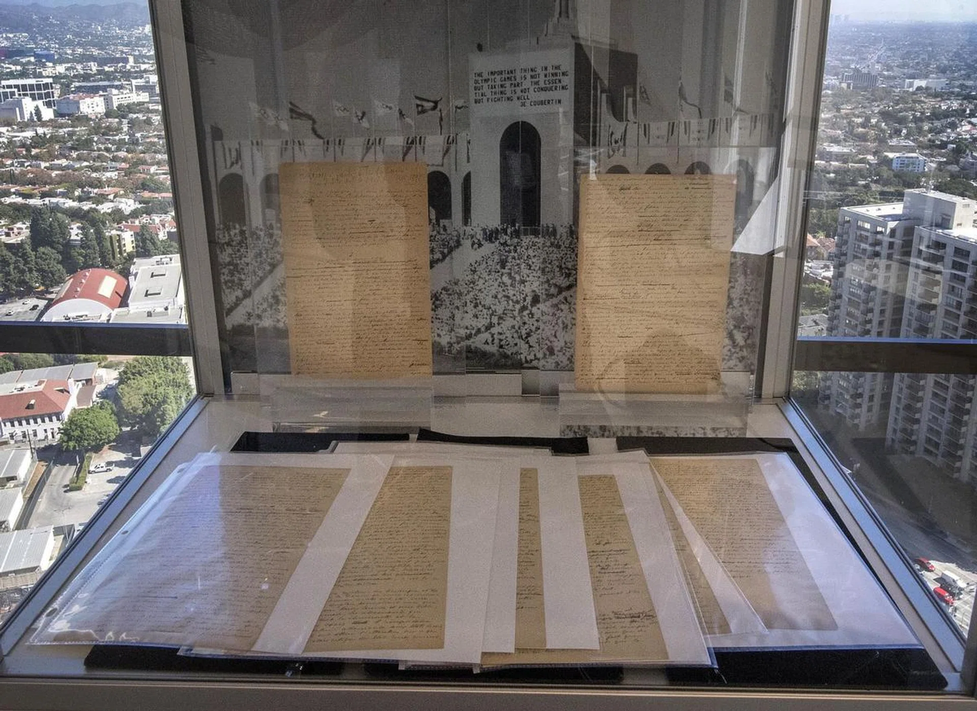 The original Olympic Games manifesto, written in 1892 by French aristocrat, educator and athletics advocate Pierre de Coubertin which outlines his vision for reviving the ancient Olympic Games as a modern, international athletic competition, on public display at Sotheby's in Century City, California, on October 23, 2019. - The manifesto will be auctioned on December 18 at Sothebyís in New York. (Photo by Mark RALSTON / AFP)