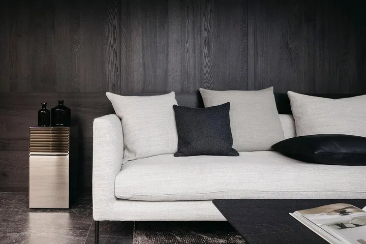 The furniture’s clean lines continue the sleek visual language that defines this bachelor pad. (Photo: Studio Periphery)