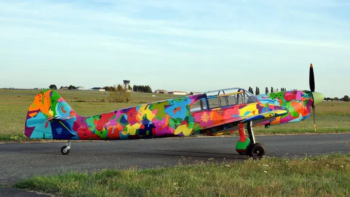 1934 Nord 1000 airplane painted by Cyril Kongo with the titles of various books written by Antoine de Saint Exupéry. (Photo: Harald Gottschalk)