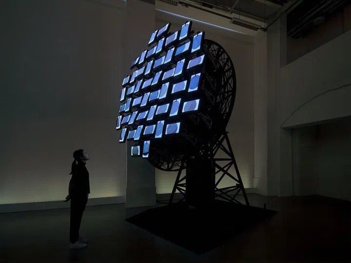 Phoebe Hui looks at her artwork 'The Moon is Leaving Us', created for the Audemars Piguet Art Commission.