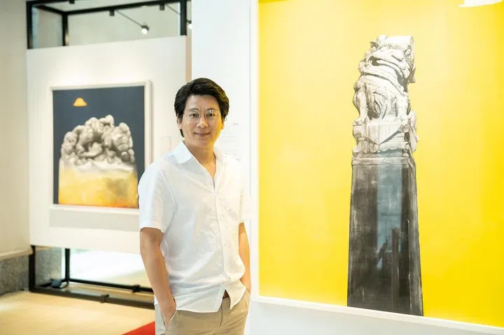 Leo Liu in front of his solo exhibition at UOB Art Gallery, Listening to Clouds. (Photo: UOB)