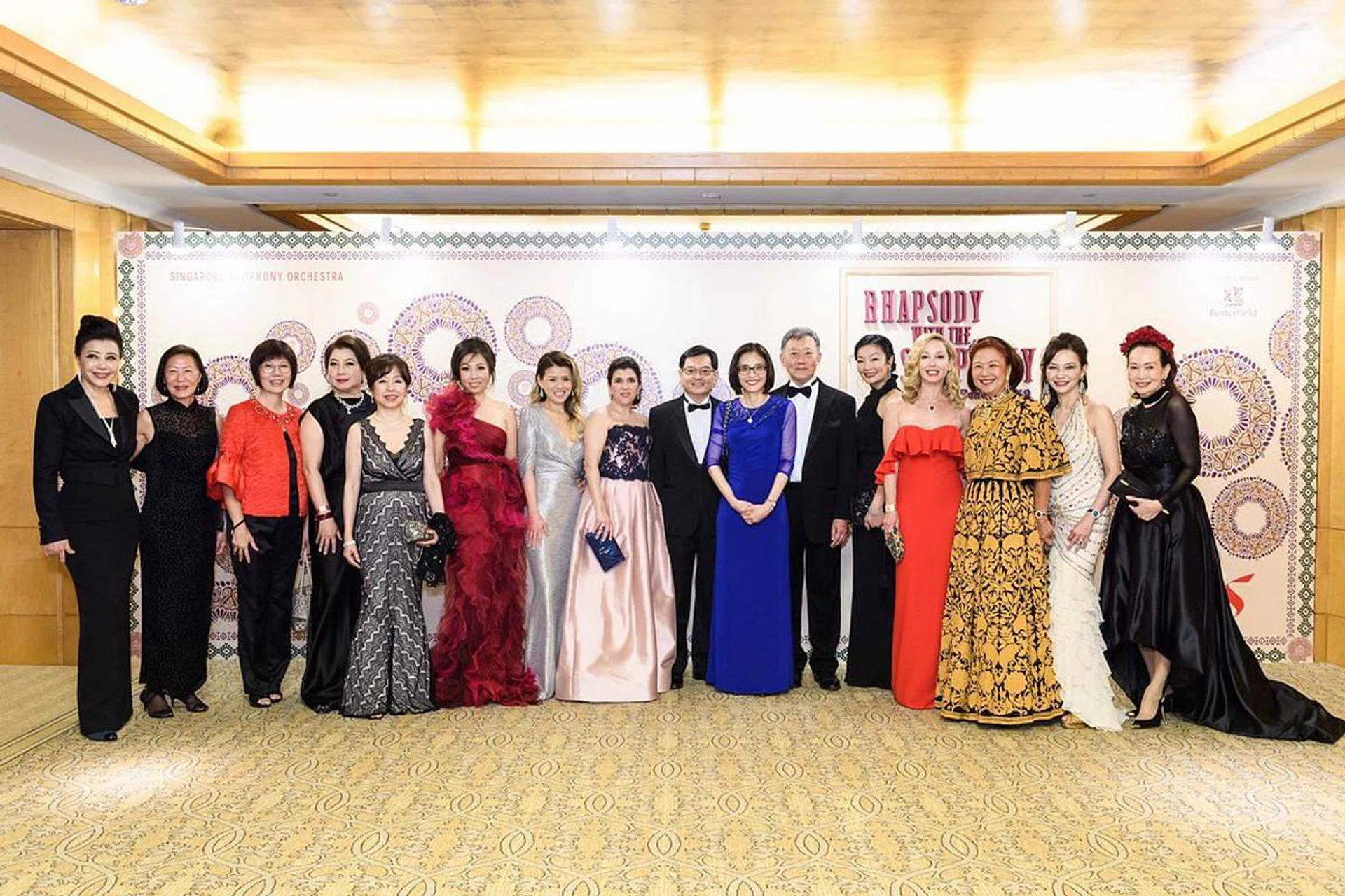 Guest of Honour Mr Heng Swee Keat in the company of the SSO Ladies' League, featuring Grace Yeh, Dr Kwan Lui, Professor Annie Koh, Kris Tan, Rosy Ho, Clarinda Tjia-Dharmadi-Martin, Judy Hunt, Odile Benjamin, Chang Hwee Nee, SSG Chairman Goh Yew Lin, Maisy Koh, Paige Parker, Kim Camacho, Dr Julie Lo & Celeste Basapa