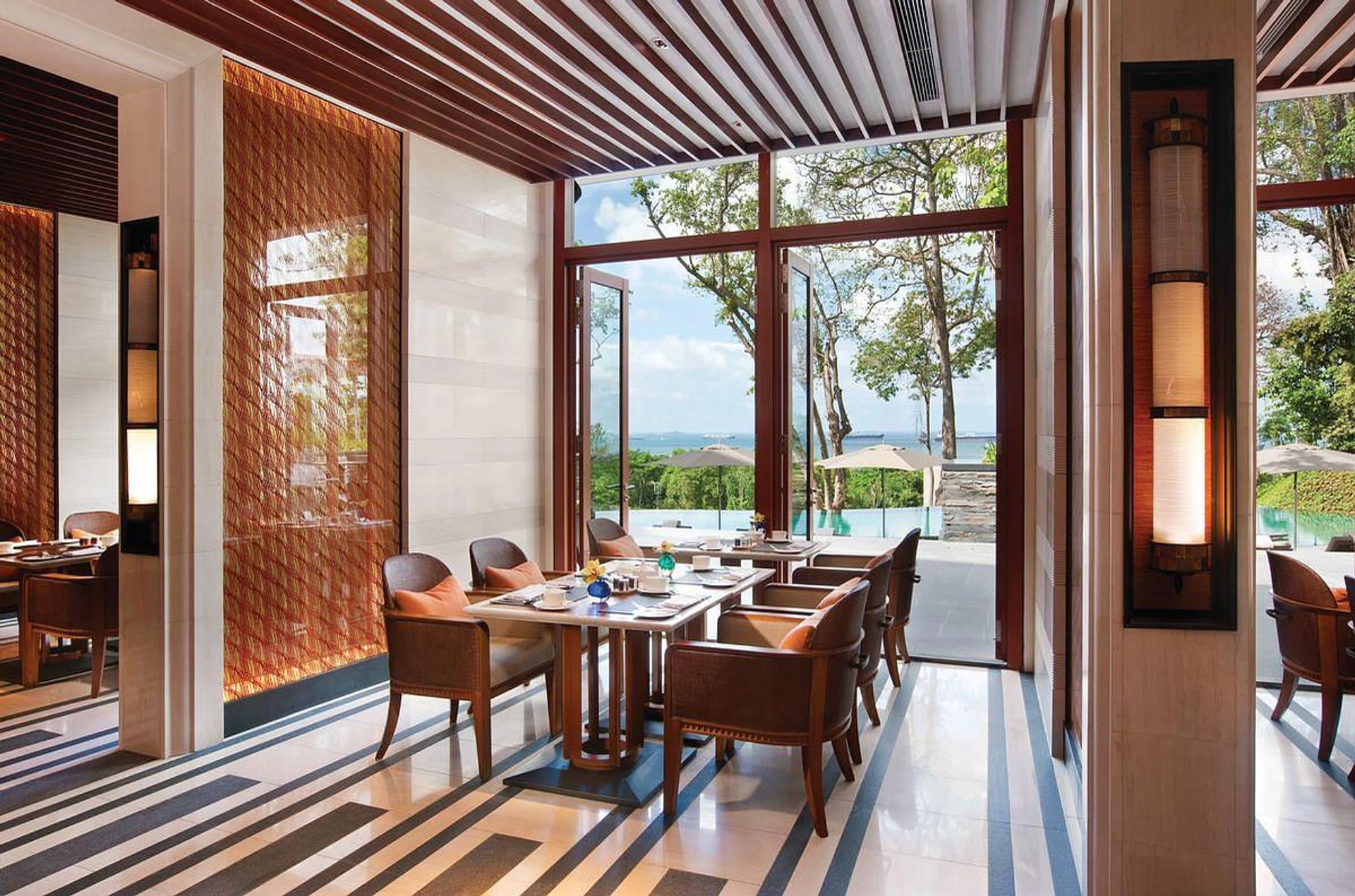 The restaurant affords gorgeous views of the sea and the pool.