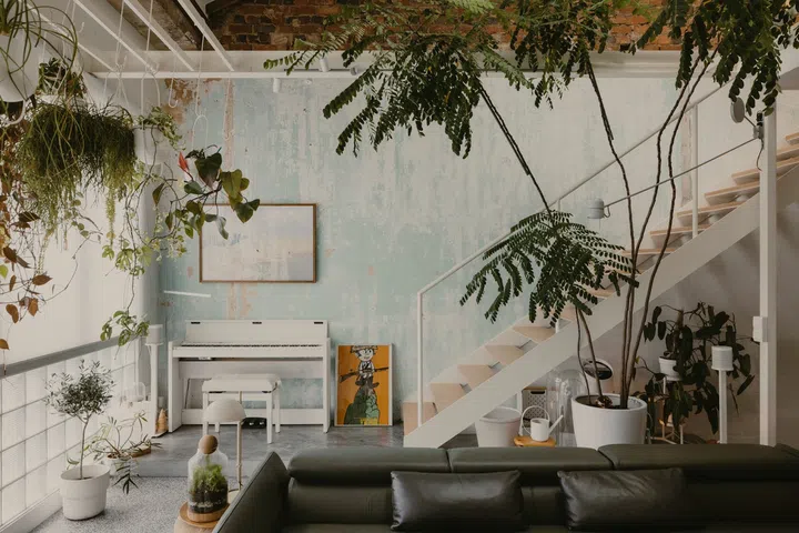 After removing the initial layer of paint, the owners decided to keep the original green paint beneath as a highlight. (Photo: Studio Periphery)