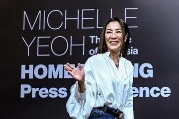 Malaysian actress Michelle Yeoh, winner of the Oscar for Best Actress in a Leading Role for "Everything Everywhere All at Once", arrives to give a press conference in Kuala Lumpur on April 18, 2023. (Photo: Mohd Rasfan / AFP)