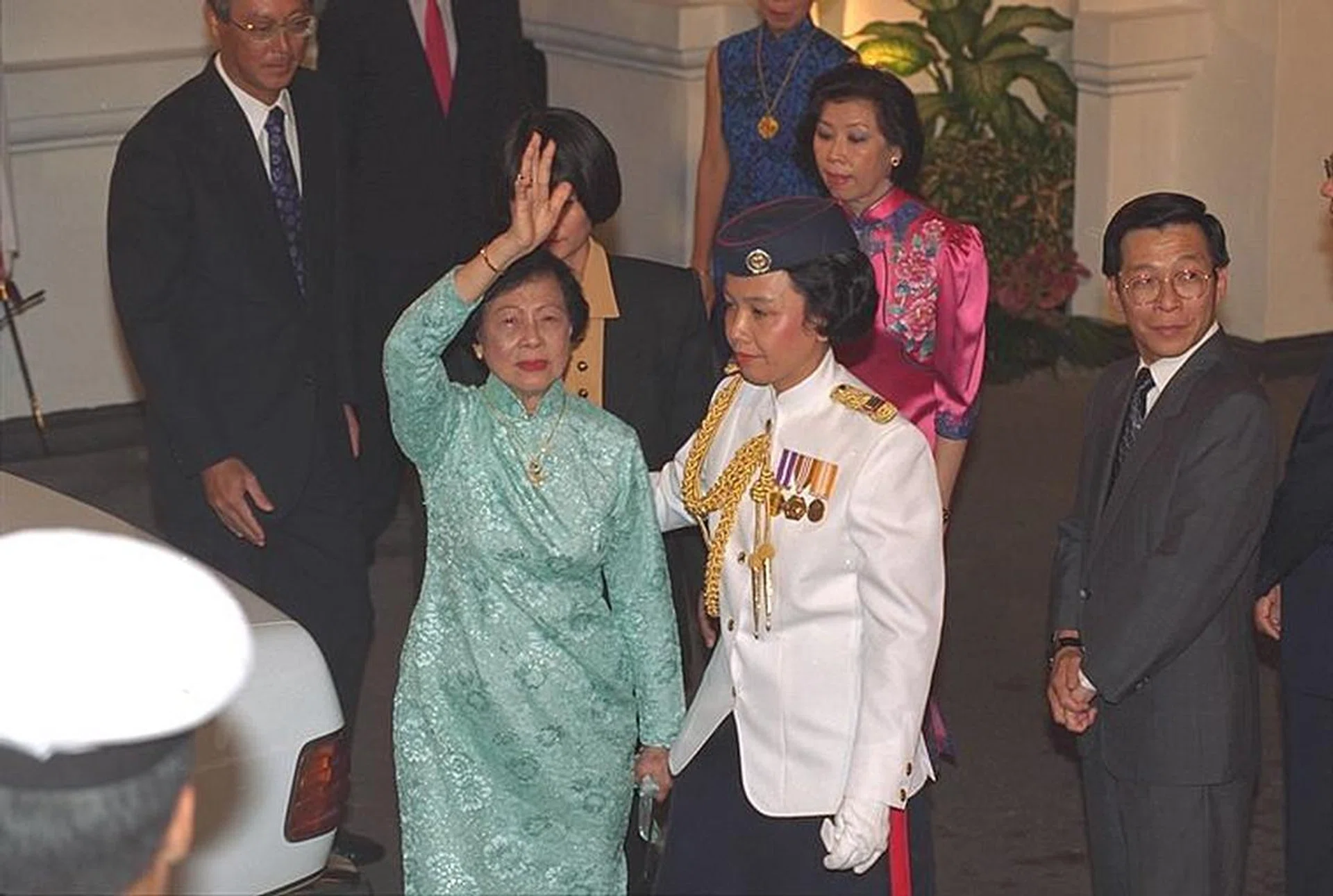 The swearing-in of Ong Teng Cheong as President was preceded by an emotional state send-off for outgoing President Wee Kim Wee and the First Lady. Accompanied by PM Goh Chok Tong, Mr Wee, 78, inspected the Guard of Honour and bade farewell to the cabinet ministers before departing from the office he held for eight years. Mrs Wee's eyes were wet when she stepped into the white State car.
