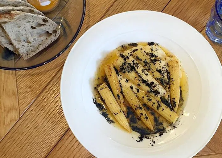 Charred baby corn with prawn head butter