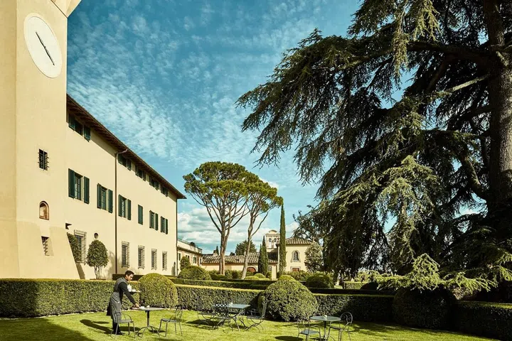 The facade and grounds of COMO Castello del Nero still bear a distinctive Tuscan country house look. (Photo: COMO Hotels & Resorts)