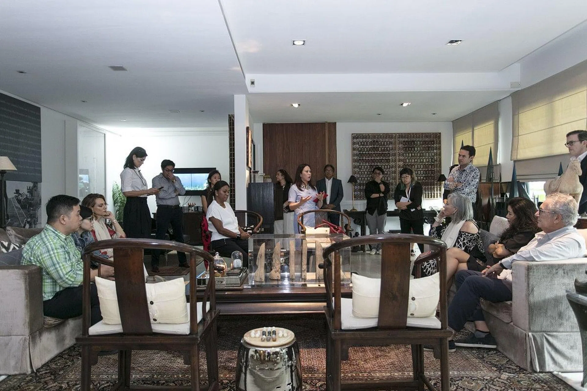 Collectors Michelangelo and Lourdes Samson show the Samson's Private Collection to a group of visitors, including Sigit and Vania Nugroho, Guita Abidari, Rita Targui, Andrea and Mark Epstein, Zainab Slovenski, Ralph Siebenaler, Lia Ying Mei, Vivian Chandran, Manuella Campisibille, Ingrid Hanson, Tyler Rollins, Eric Booth, Song-Par Tan, Lisa Botus, ahead of ART STAGE Singapore in Singapore, Singapore, on 25 January 2018. Photo by Don Wong/Studio EAST