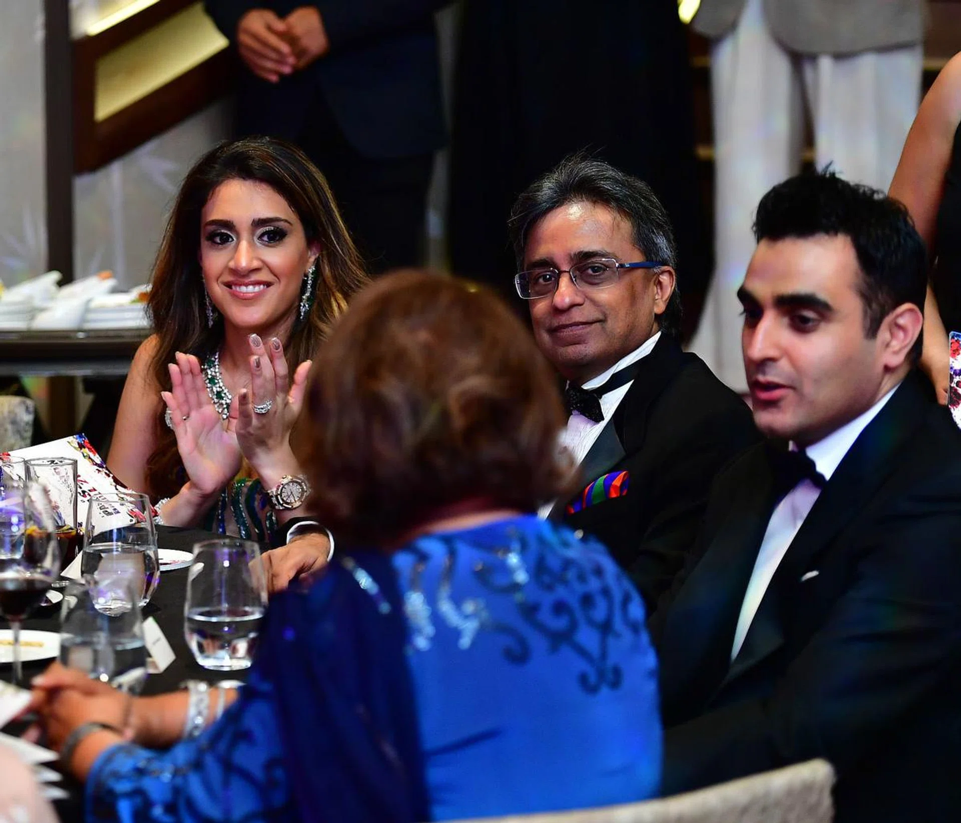 Mahesh Buxani at the 2019 Passion Ball with his daughter-in-law and friend.