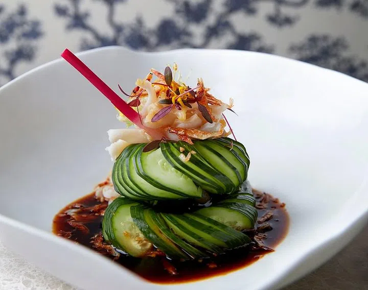 Yi's hundred-ring cucumber with sea whelk, a dish that requires deft and precise knifework