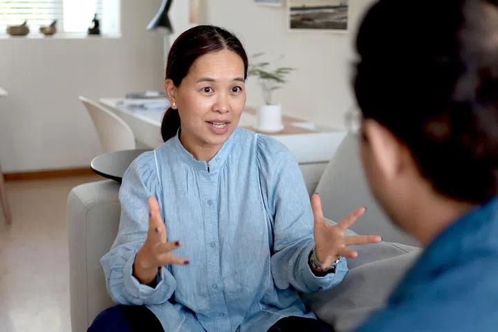 Integral coach Chee Yan Yi with a client during a coaching session.