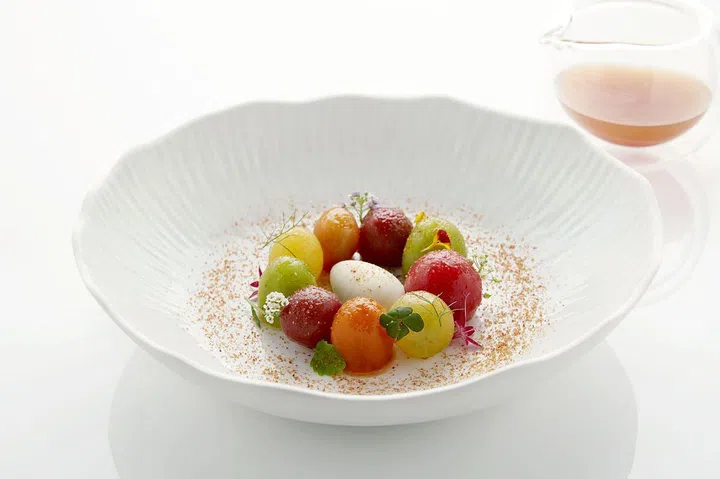 Tomato Myriad - tomato consomme, elderflower, burrata ice cream